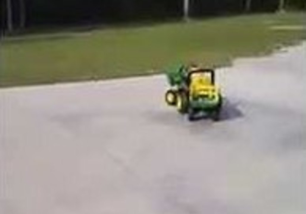 Little Boy Falls Asleep on Tractor