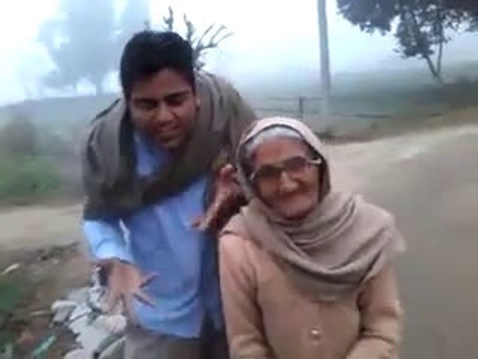 young boy joking with old women.shameful