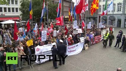 Немцы освистали Яценюка и назвали его террористом