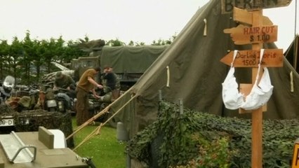 WWII enthusiasts re-enact camps in Normandy