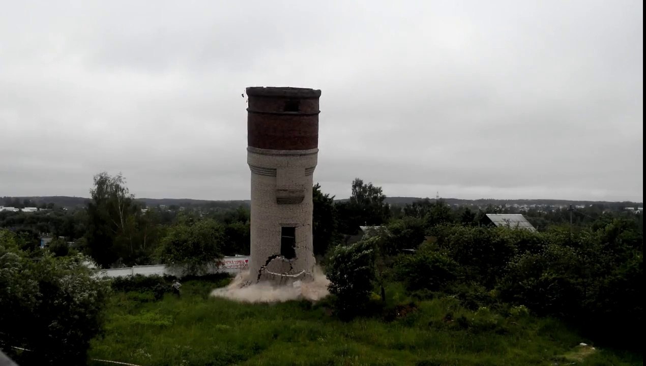 Crazy guys destroying a tower .. Run dude! Run!!!!!