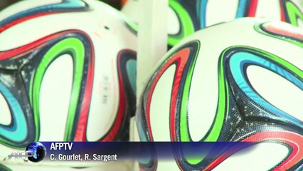 Pakistan workers fire 'Brazuca' ball to Brazil World Cup