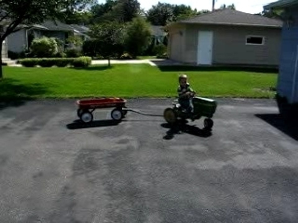 Ben driving the tractor