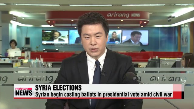 Syrians begin voting in presidential election amid civil war