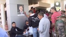 Syria claims large turnout in presidential election set to bolster Assad regime