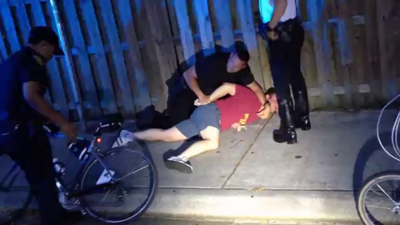 Cops tackle critical mass cyclist (Full Video)