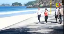 Adriana Esteves é vista correndo na orla de praia