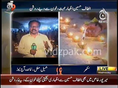 MQM Workers Gone Crazy - MQM workers burn lamps with their blood to show their support for Altaf Hussain