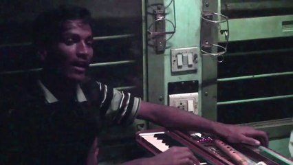 common man singing song in indian train