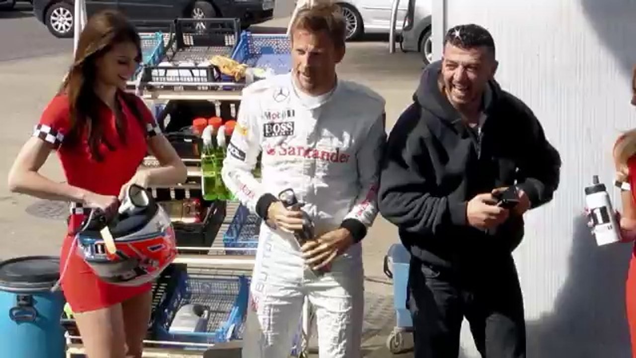 Jenson Button brings McLaren MP4-29 to F1-themed car wash