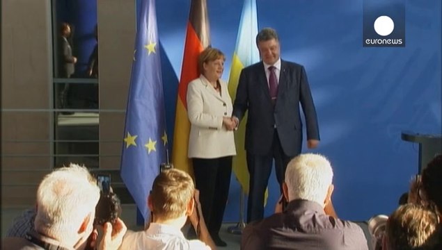 Merkel: Germania al fianco dell'Ucraina nella crisi con la Russia . La cancelliera riceve Poroshenko a Berlino