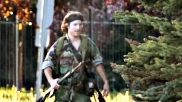 Suspect arrested in Canadian police killings, ending manhunt