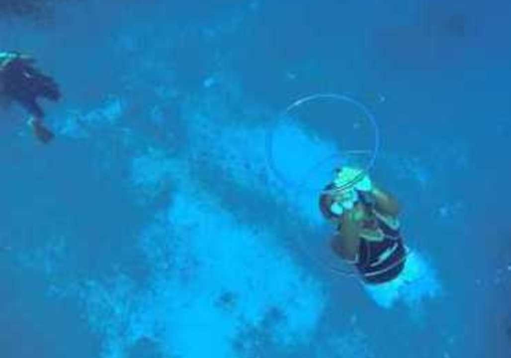 Divers Create Underwater Bubble Fun
