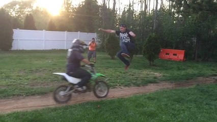 Getting kicked off a dirt bike
