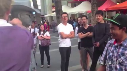 Human Statue Punches Hecker