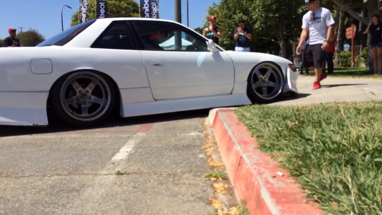 Way too much tuning on a car = stuck on the sidewalk!