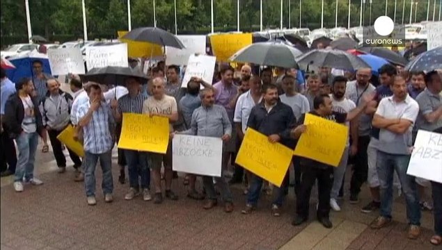 Europe's taxi drivers in go-slow protest against mobile phone app Uber
