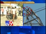 Vijayawada man climbs tower, threatens to commit suicide