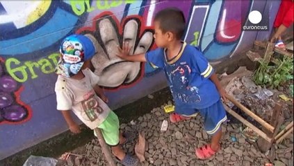 Graffiti brings school to Jakarta's street kids