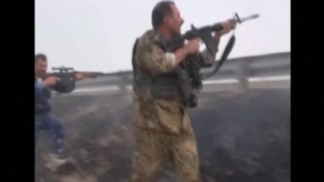 Iraq Kurds take Kirkuk as Sunni militants surge toward Baghdad