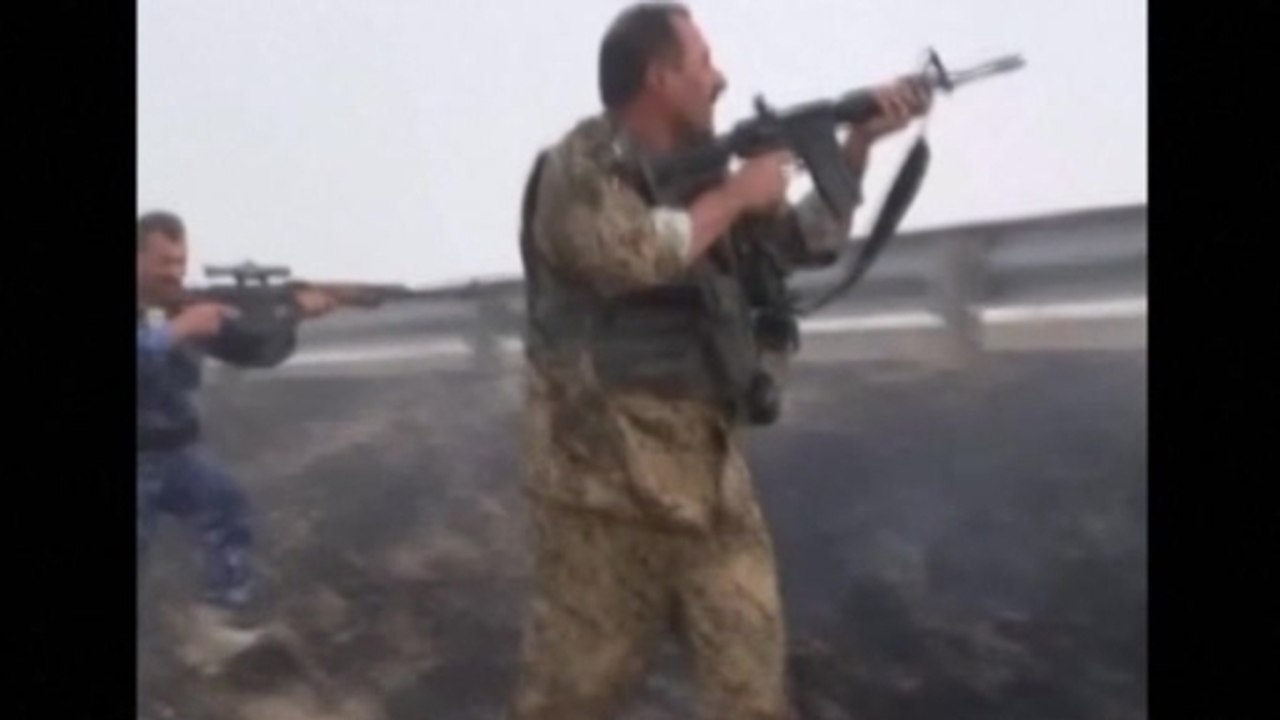 Iraq Kurds take Kirkuk as Sunni militants surge toward Baghdad