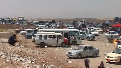 Mass exodus in northern Iraq as Sunni rebels surge towards Baghdad