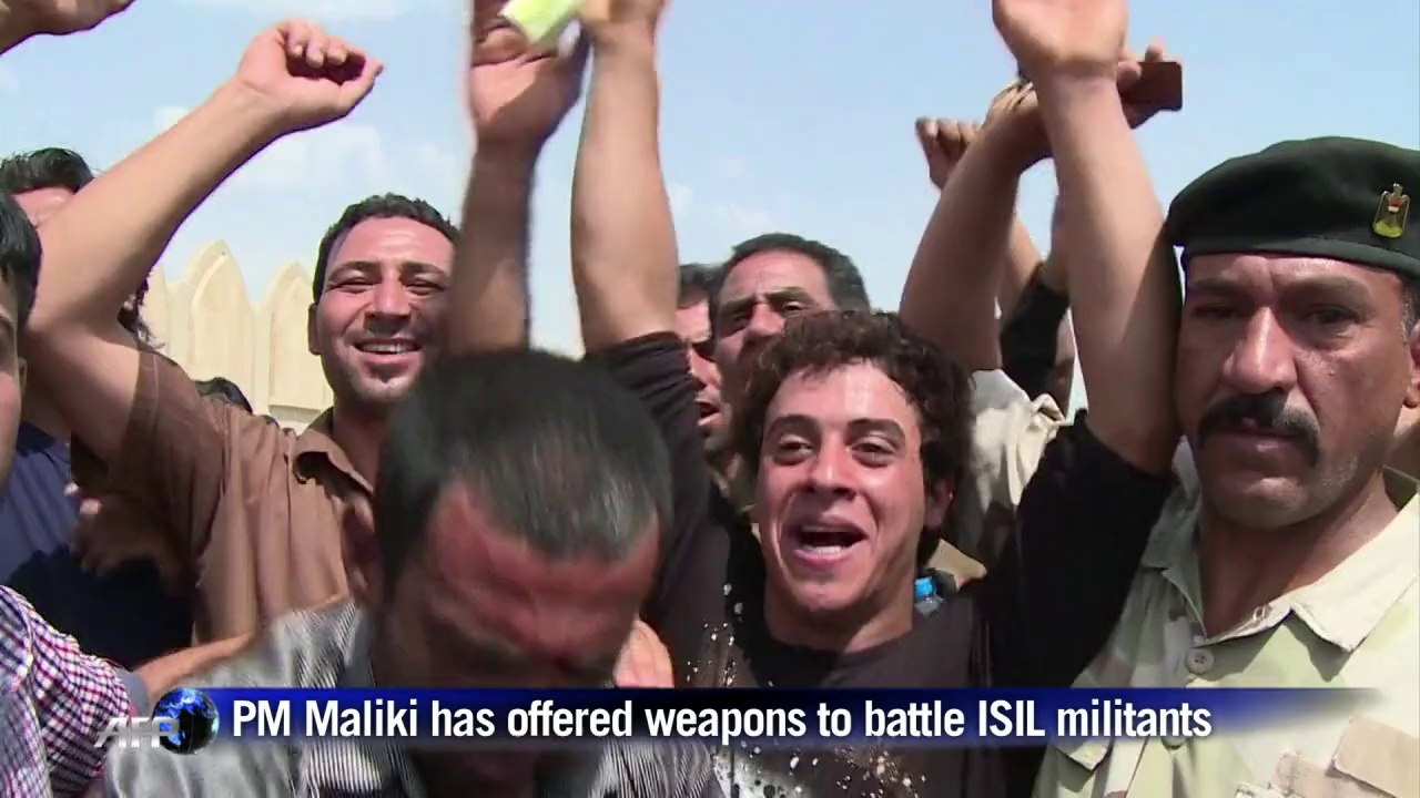 Iraqis volunteer to fight jihadists with government arms