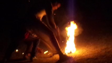 Boys Are Playing On a Fire