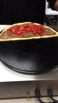 Crepe ( Nutella-Strawberries, Topped with Chocolate sauce )