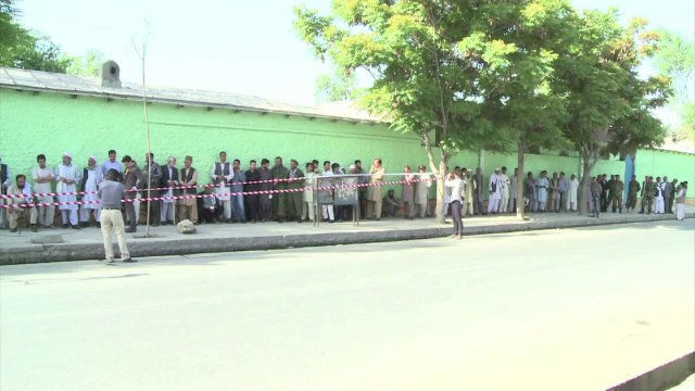 Afghans vote in run-off election despite Taliban threats