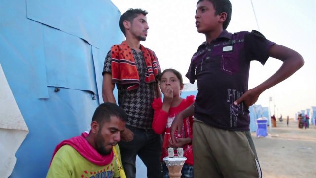 Iraqis fleeing Sunni insurgents take shelter in Kirkuk