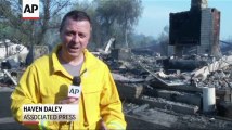 Fires leave smoldering homes, scorched earth