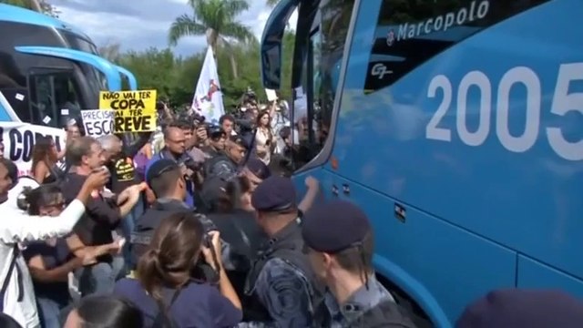 Brazilian team is swarmed by anti-world cup demonstrators