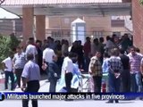 Suicide bomb at police checkpoint kills at least 21 in Iraq