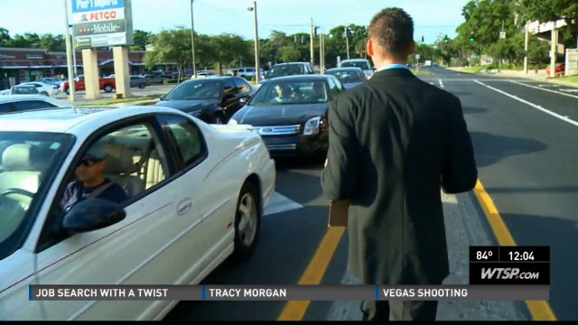 College grads take job hunting to Florida streets