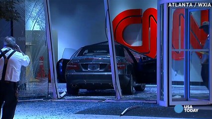 Car drives through CNN Center lobby