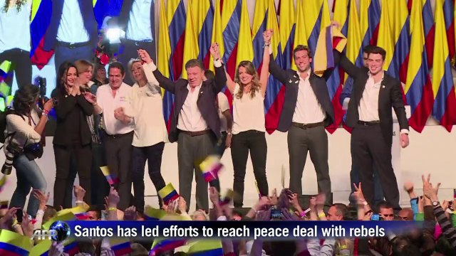 Colombians re-elect Santos in boost for FARC talks