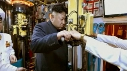 North Korea releases images of Kim Jong Un on a submarine
