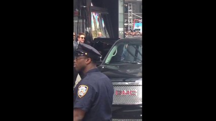 17.06.2014 NYC Fan  Robert Pattinson going to his car after GMA The Rover