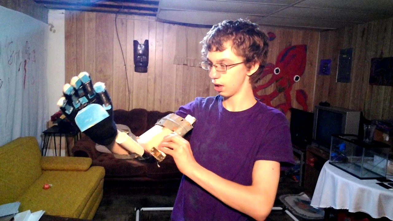 exoskeleton suit. "made to lift 100 pounds!" bionic exoskeleton suit 2014. exoskeleton body armor.