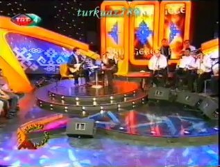 Songül KARLI-Saçlarıma Rüzgâr Değdi