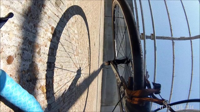 Car VS bike on pedestrian access bridge. Amazing collision