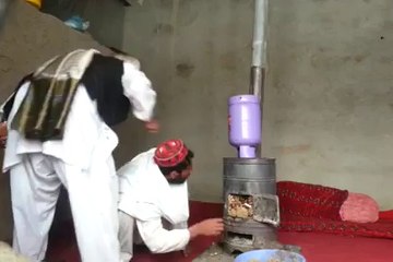 Carzy Afghan Guy Firing Stove with Liquide G