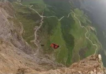 Base-Jumper and Eagle Meet Each Other Mid Air