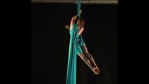 Flexible Girl Dancing On Silk Rope