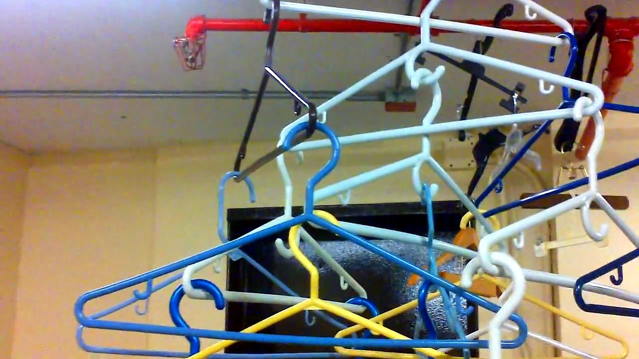 Hanging Art with unwanted Coat Hangers that was removed shortly after it's installation