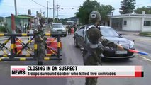 Troops surround soldier who killed five comrades