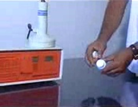 Máy dán màng nhôm chai nhựa, máy dán màng siu chai dầu nhớt, máy siu màng nhôm hủ nhựa