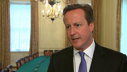 Cameron apologises for employing Andy Coulson