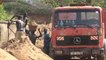 A Bangui, le travail dur et dangereux des "pêcheurs de sable"